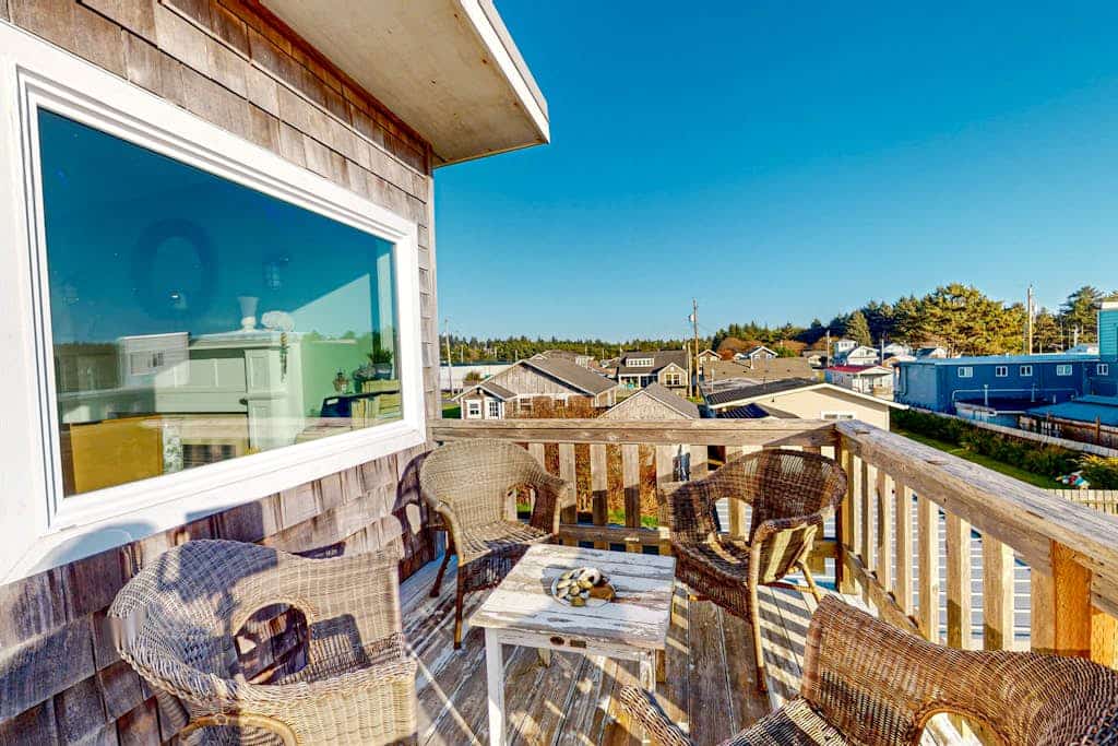 Dog-friendly condo 1 block from beach with ocean view, fireplace, balcony, & W/D