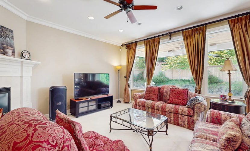 Spacious getaway home with fireplace, private patio & grill