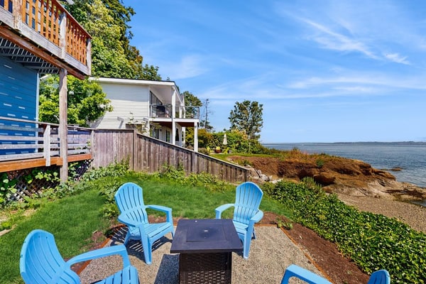 Tranquil waterfront getaway with inviting outdoor decks & beach access