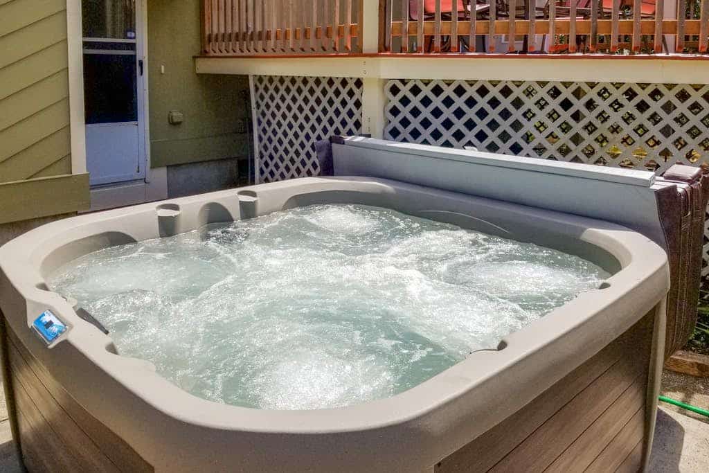Dog-friendly home with private hot tub & fireplace - only steps to the beach