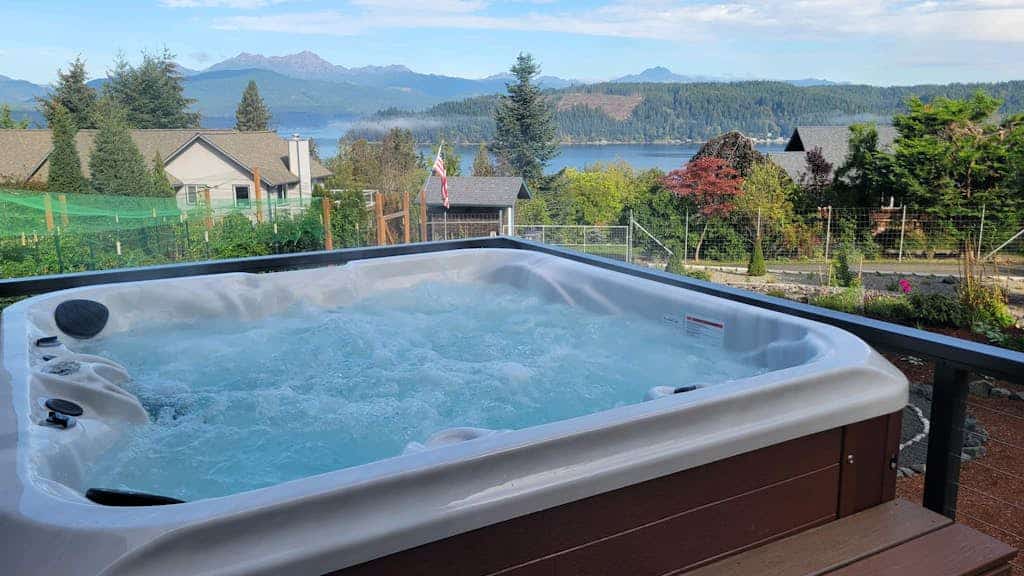 Spacious A-frame w/ mountain & water views, New Hot Tub, AC, Fireplace, W/D