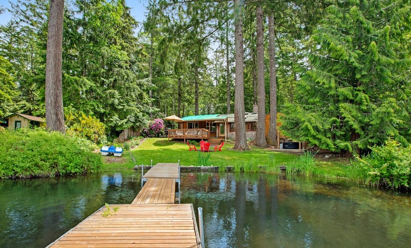 Vintage Mid-Century Modern Lakefront Log Cabin
