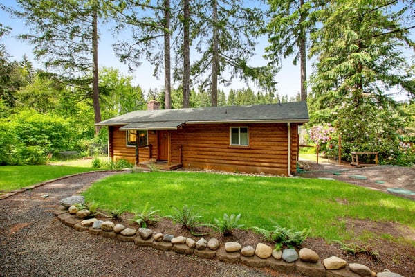 Vintage Mid-Century Modern Lakefront Log Cabin