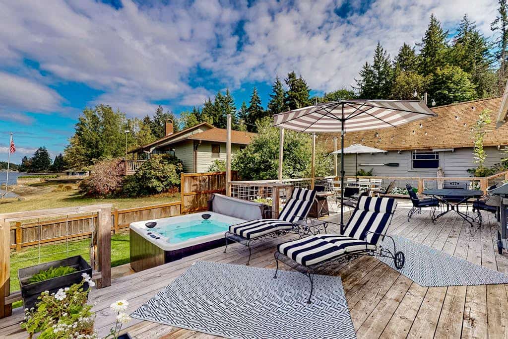 Entire waterfront property with hot tub, fire pits, patio & private beach access