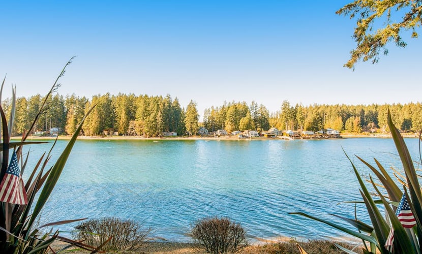 Waterfront, dog-friendly home with private beach, amazing deck & harbor view
