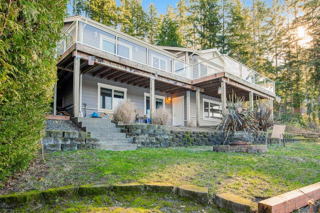 Waterfront, dog-friendly home with private beach, amazing deck & harbor view
