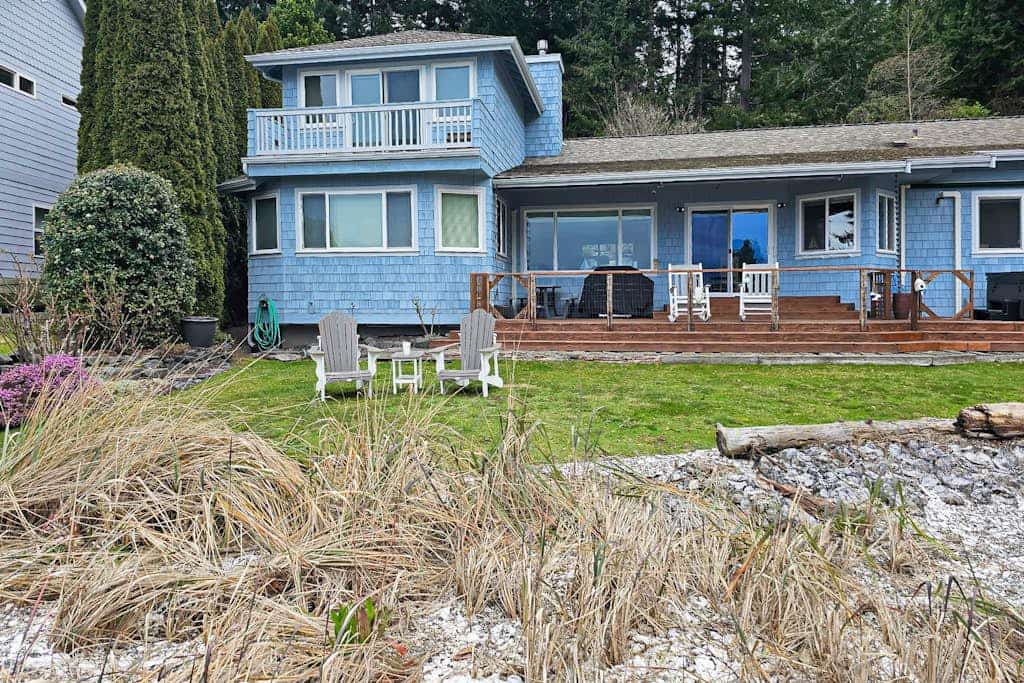Large waterfront beach house with hot tub, game room, & private beach access
