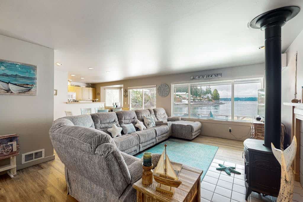 Large waterfront beach house with hot tub, game room, & private beach access