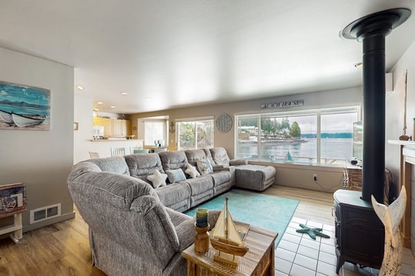 Large waterfront beach house with hot tub, game room, & private beach access