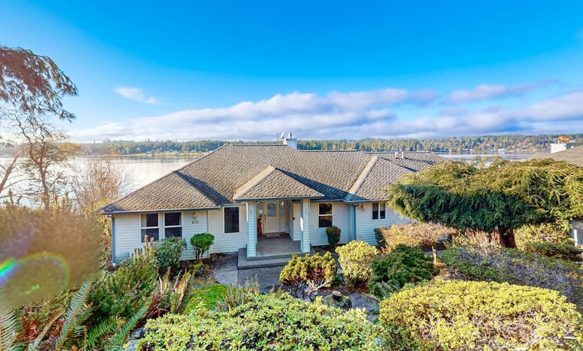 Stunning waterfront home offering breathtaking canal views & hot tub