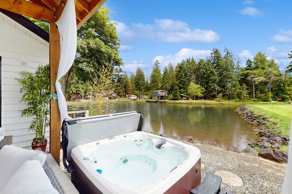 Charming Coastal Cabin with Private Shoreline & Hot Tub