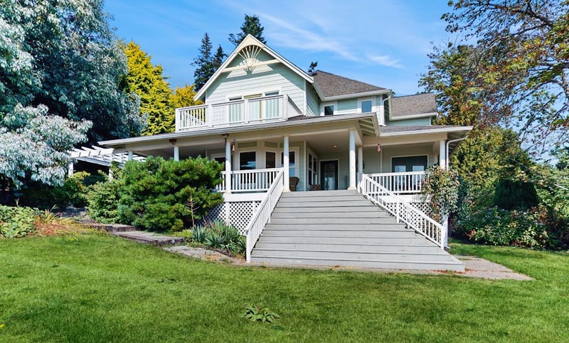 Beautiful home with foosball table, waterfront views, fireplace, basketball cour