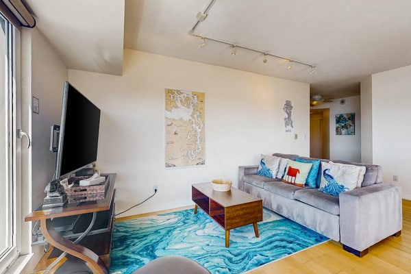 Luxury suite with fitness center, features shared pool and hot tub