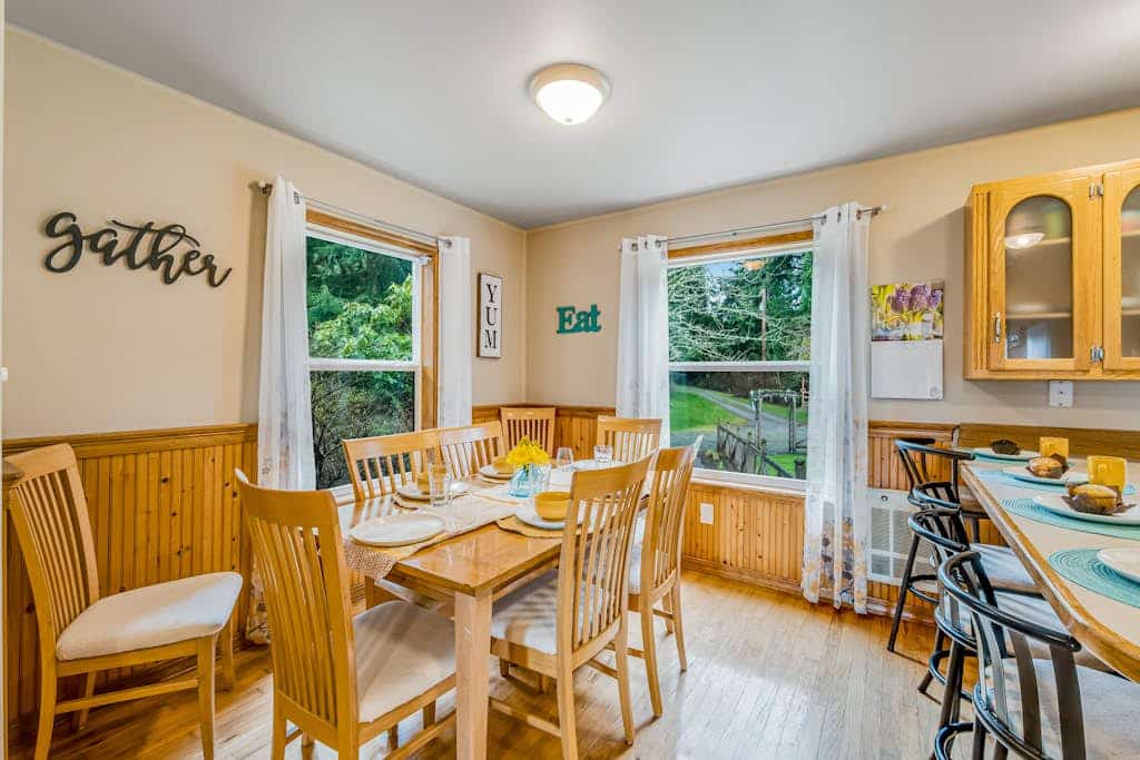 Idyllic woodsy retreat with firepit, two kitchens, Port Susan views & woodstoves
