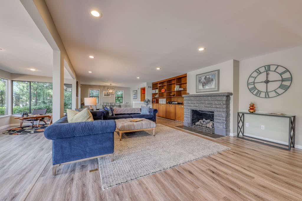 Waterfront home & on-site guest house w/ full kitchens, a large deck, & firepits