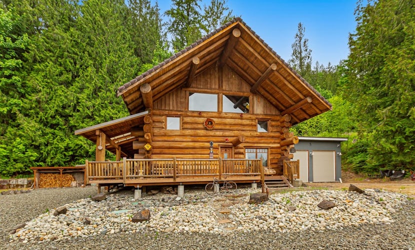 Unique mountain view log home with a wood stove, balcony, patio, & board games