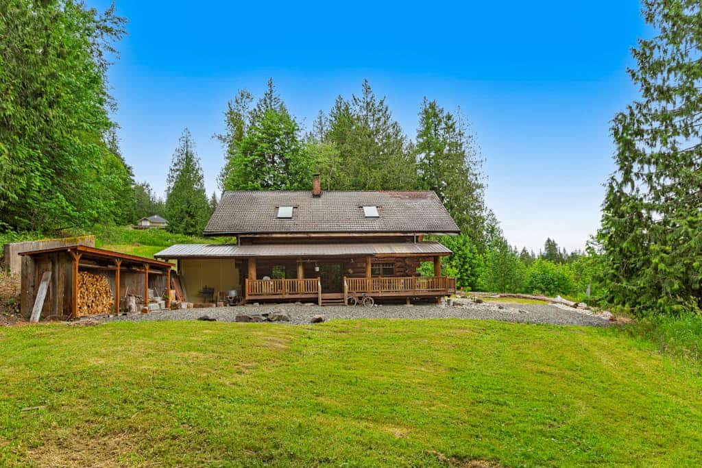 Unique mountain view log home with a wood stove, balcony, patio, & board games