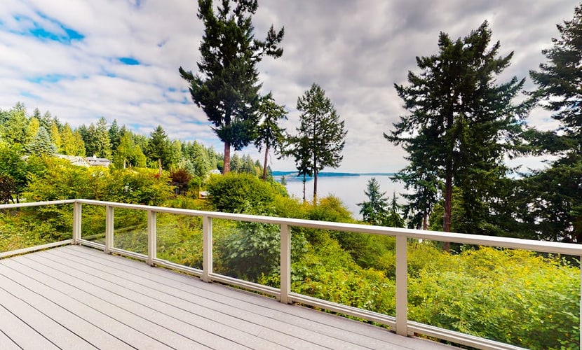 Sound view home full of vintage charm with game room, wood stove, & gas grill