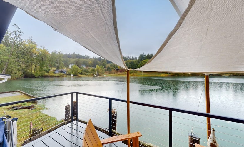 Serene waterfront home with gorgeous deck & views of the cove/mountains