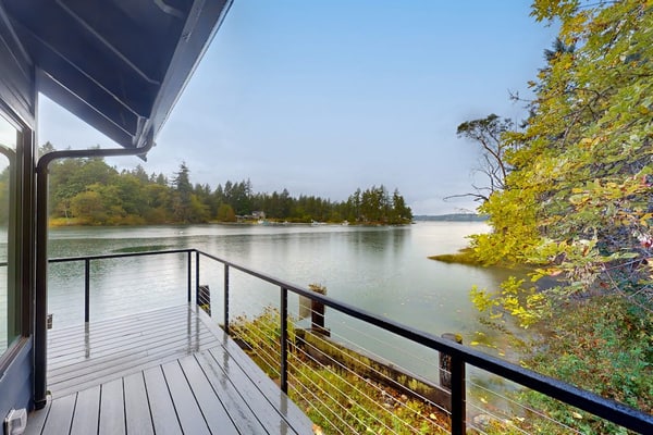 Serene waterfront home with gorgeous deck & views of the cove/mountains