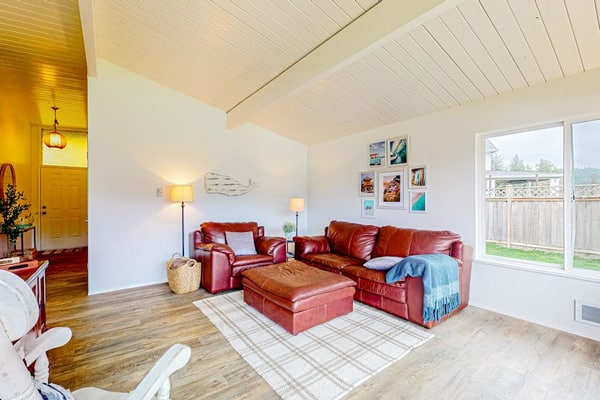 Bay-front dog-friendly home on one acre of land with modern interior & W/D