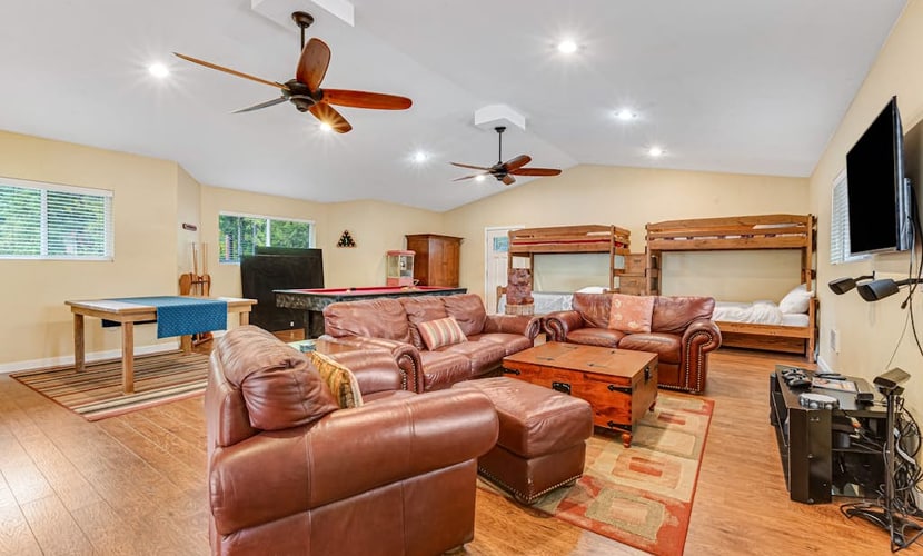 Lakefront retreat with kayaks, canoe, game tables, children's items, and W/D