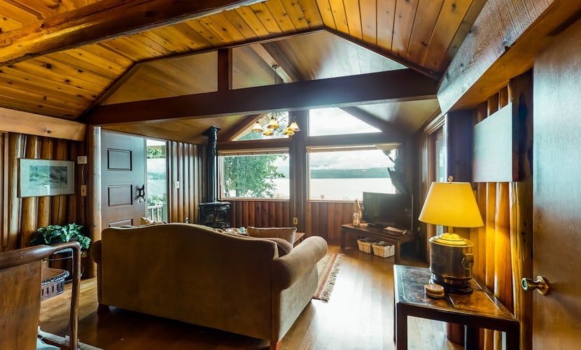Charming waterfront home with full kitchen, furnished deck, & incredible views