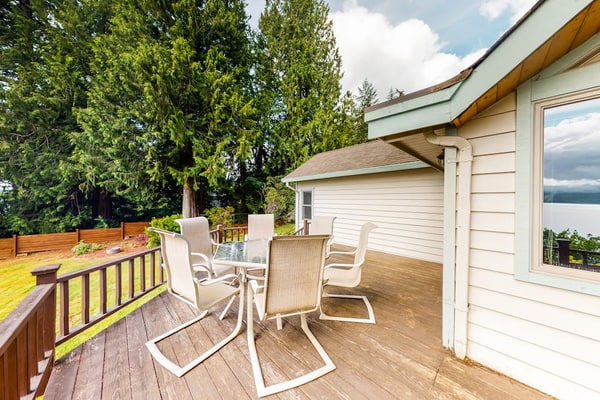 Charming waterfront home with full kitchen, furnished deck, & incredible views