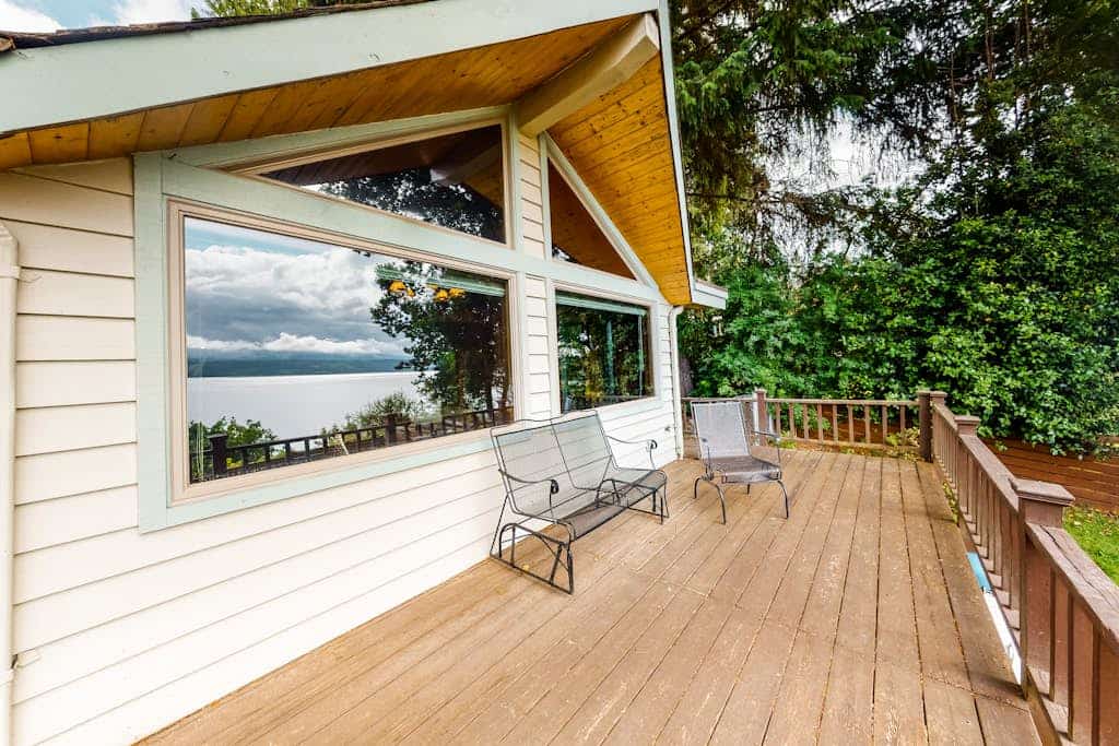 Charming waterfront home with full kitchen, furnished deck, & incredible views