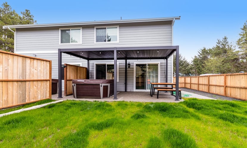 Modern townhome with enclosed yard, private hot tub, & WiFi - dogs welcome