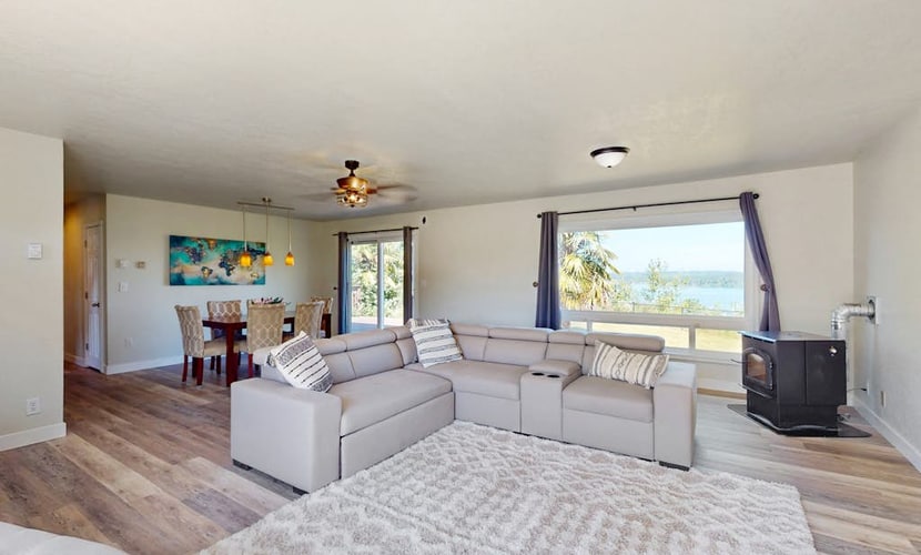 Soundfront home with WiFi, washer/dryer, central AC, and enclosed yard