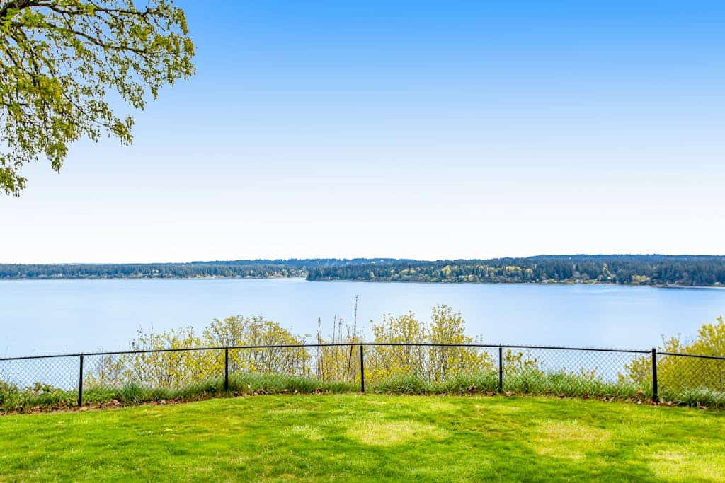 Soundfront home with WiFi, washer/dryer, central AC, and enclosed yard
