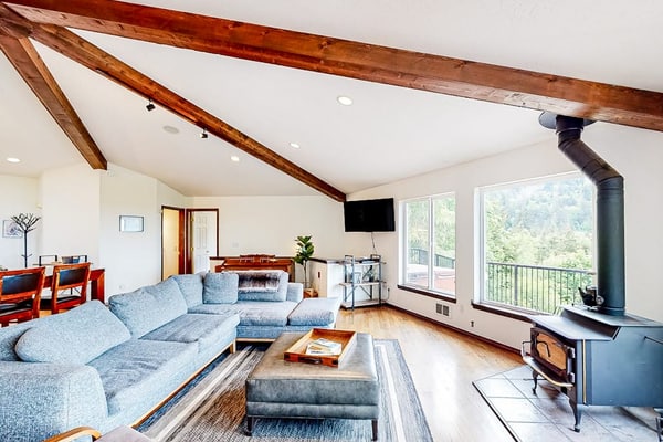 Idyllic home with water views, wrap-around deck, hot tub, and firepit - dogs ok