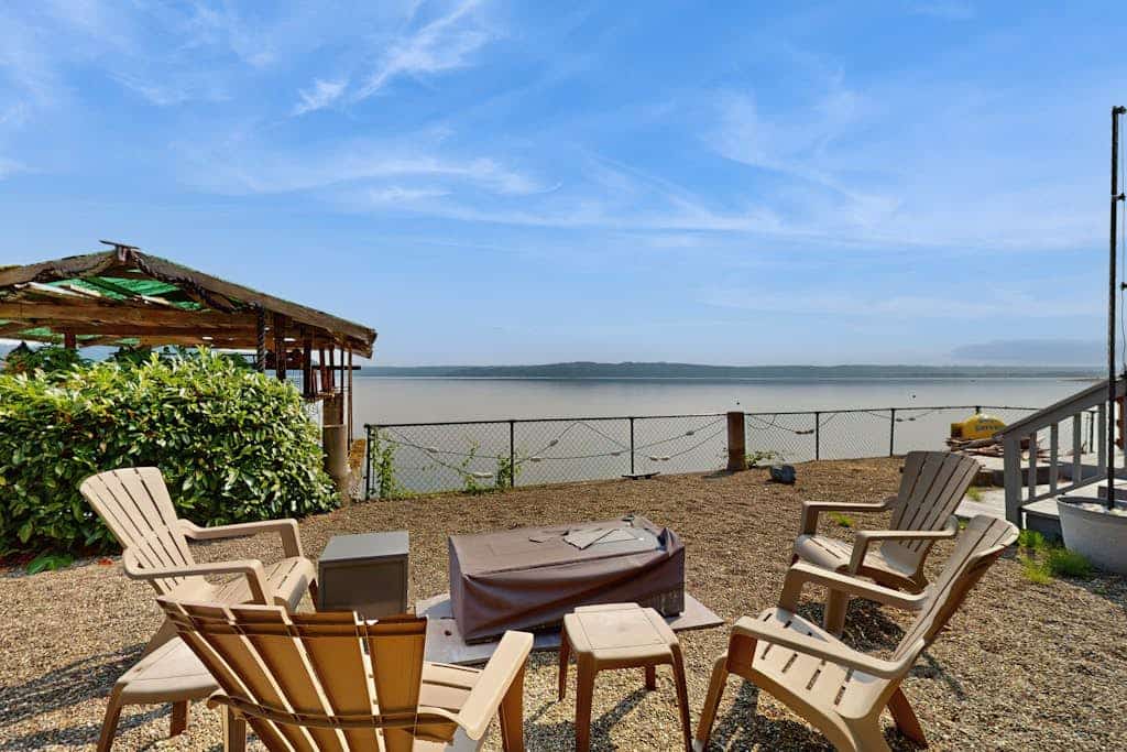 Charming water front home with amazing views, fire pit, and private deck