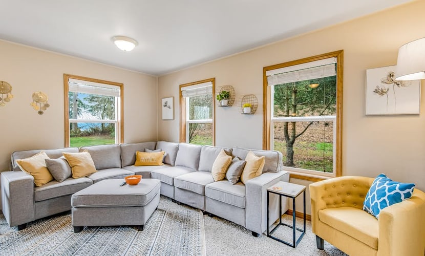 Stunning waterfront getaway with firepit, woodstove, & scenic deck