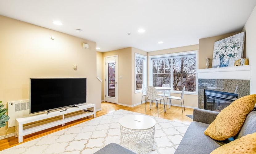 Corner Townhome with Deck, Tons of Natural Light, WiFi, & Gas Fireplace