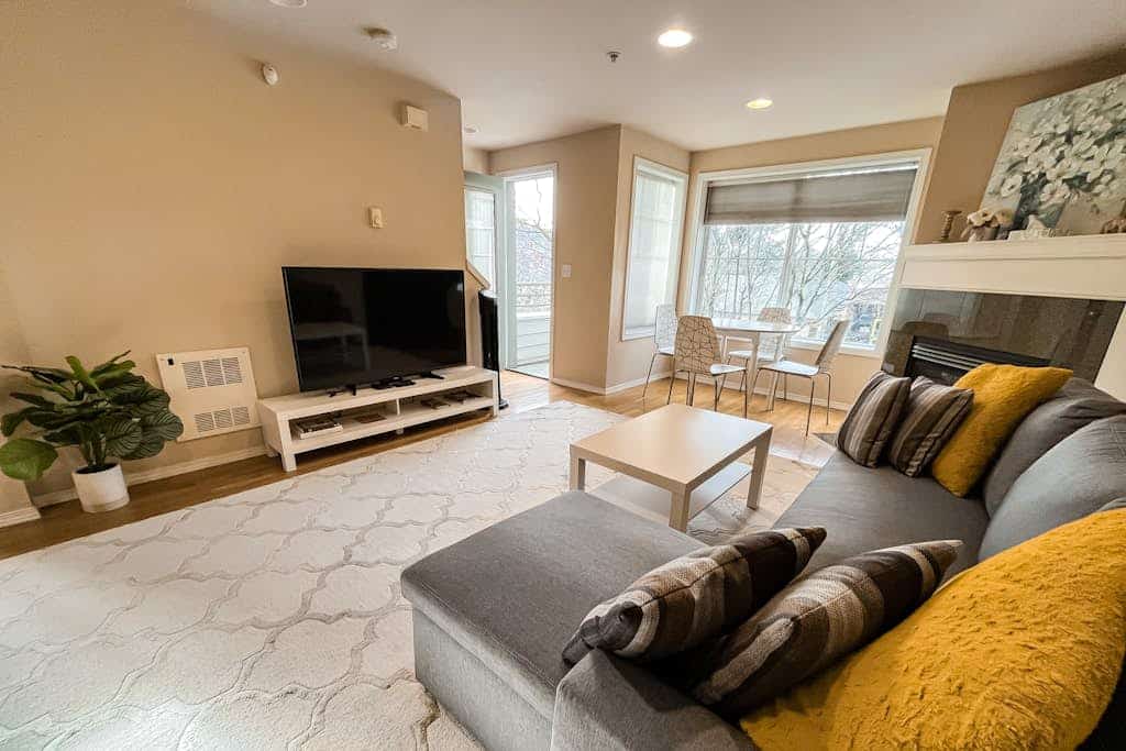 Corner Townhome with Deck, Tons of Natural Light, WiFi, & Gas Fireplace