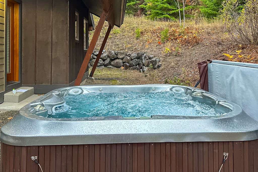 Mountain-view house with hot tub, chef's kitchen, fireplace, and home office