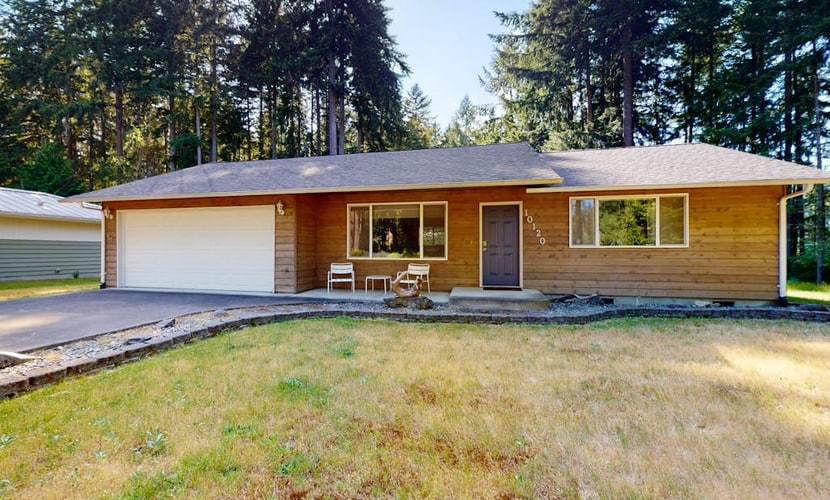 Water-view home & bunkhouse with lake access, canoe, kayaks, firepit, & W/D