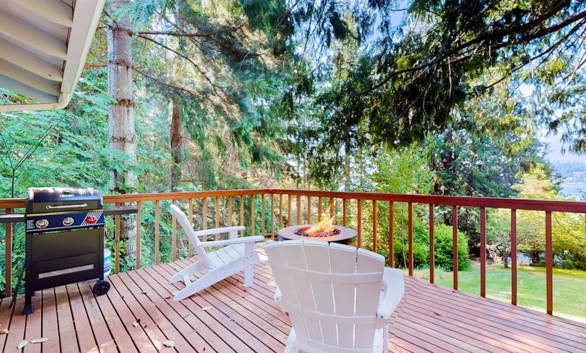 Sound view retreat with trails, beach access, firepit, grill, scenic deck, & W/D