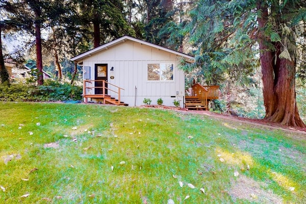 Sound view retreat with trails, beach access, firepit, grill, scenic deck, & W/D