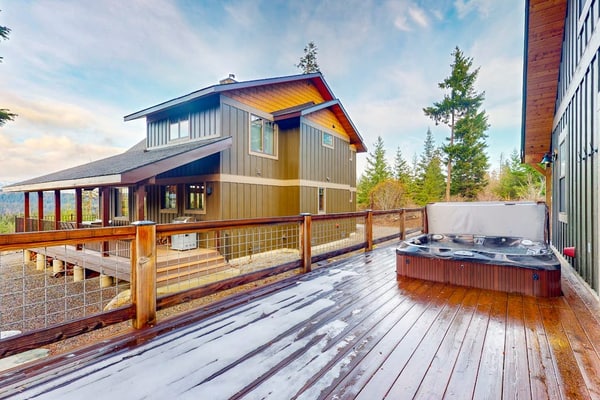 Modern mountain home with two cabins, hot tub & stunning views
