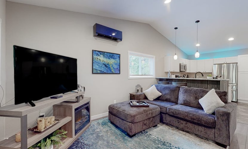 Inviting riverfront home with full kitchen, firepit, W/D, & dog-friendly