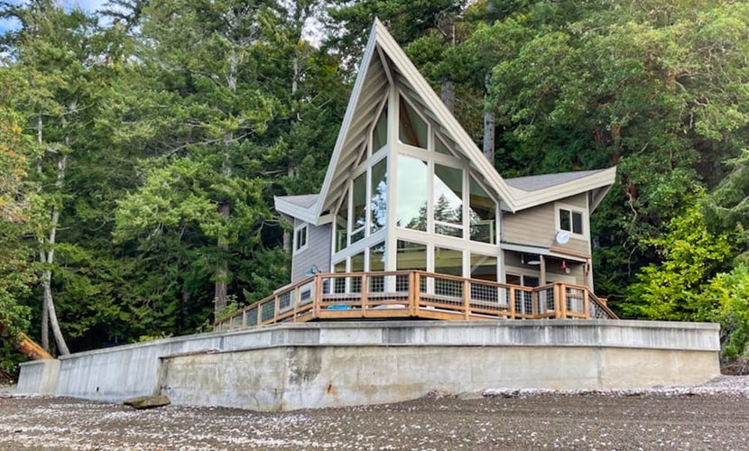 Stunning waterfront property with private beach, amazing views, and huge loft