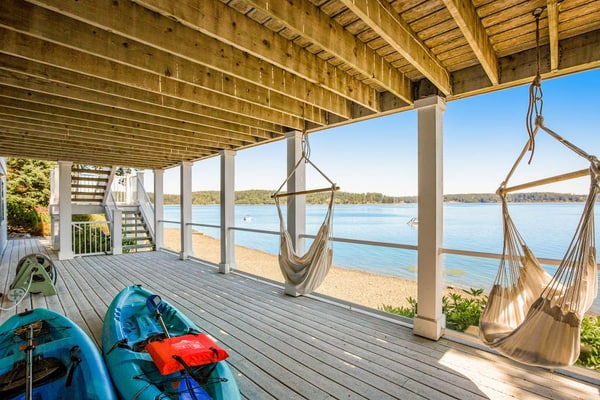 Updated home on the water with 2 decks, amazing views, & amenities to enjoy