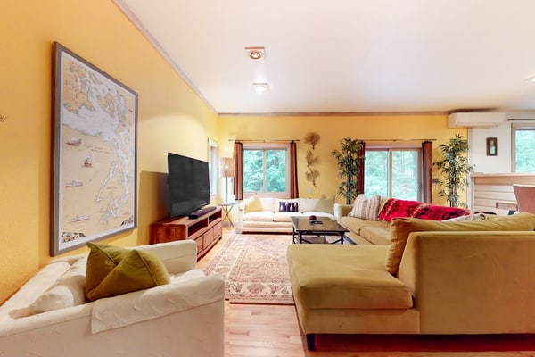 Tree-lined retreat with wood fireplace, board game collection, & pool access