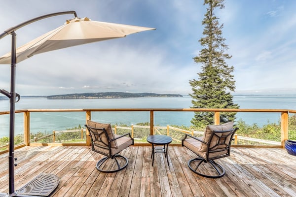 Dog-friendly home with stunning bay views, woodstove & outdoor firepit