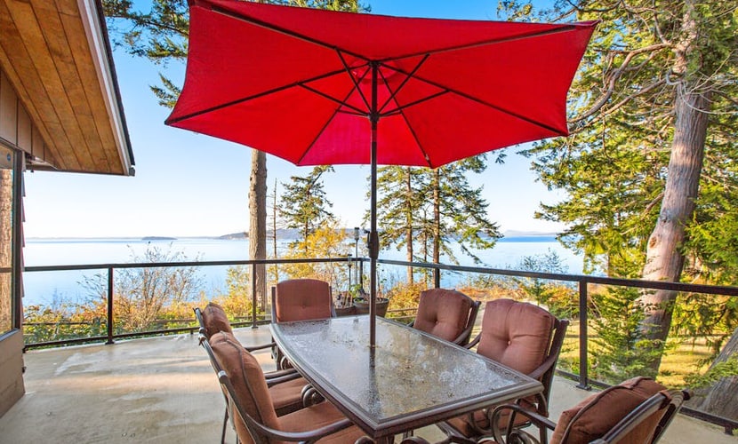 Updated sound front home with water & mtn views, fireplace, firepit, balcony