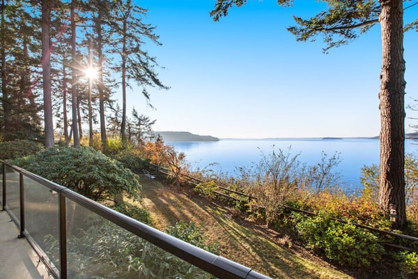Updated sound front home with water & mtn views, fireplace, firepit, balcony