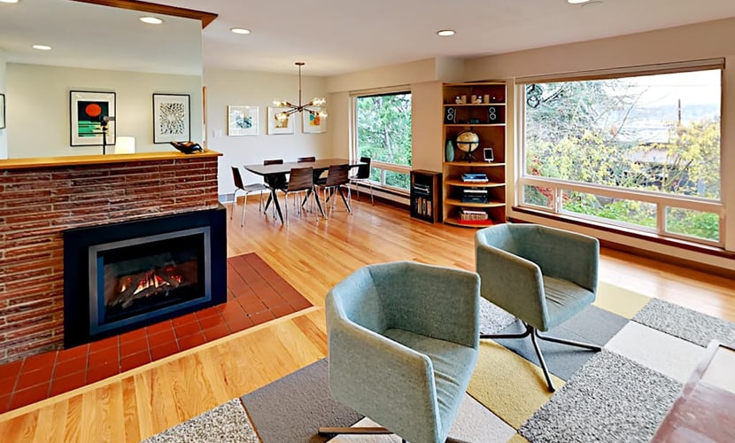 Mid-century modern home with canal & mountain views, & great location